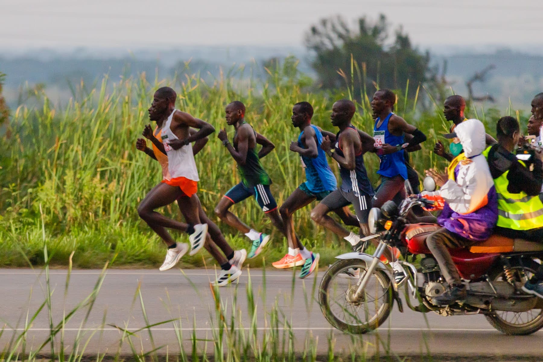 Runners on the road in an organiser photograph from the 2025 Rwenzori Marathon.